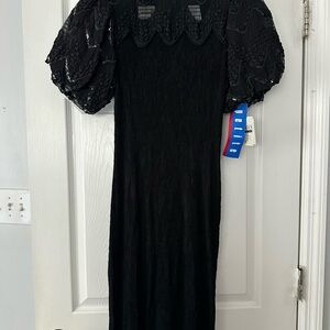 Chic Black Midi Dress with Textured Sleeves